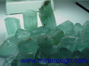 Aquamarine milk rough crystal in transmitted light